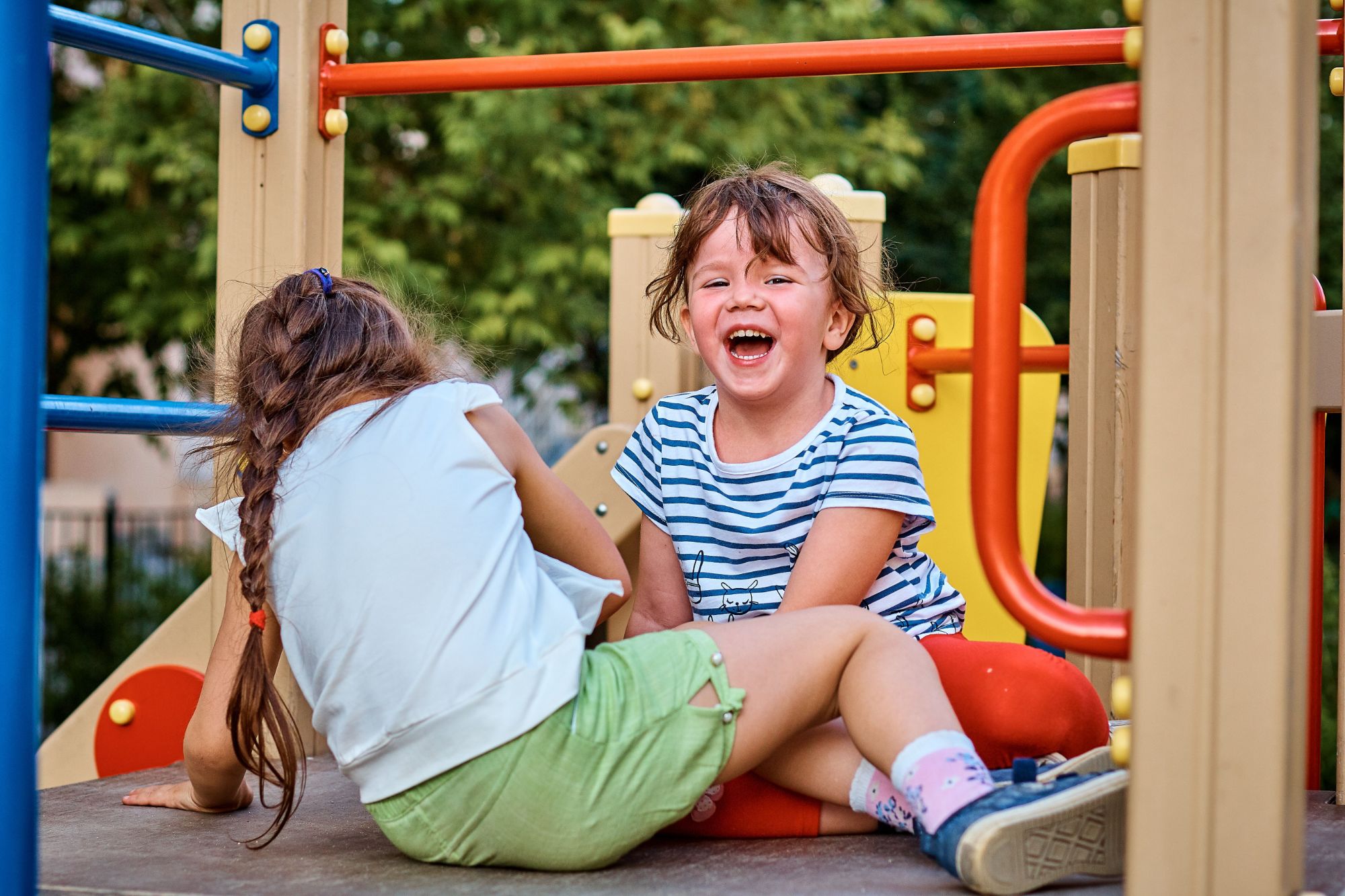 Children playing together in a primary school playground